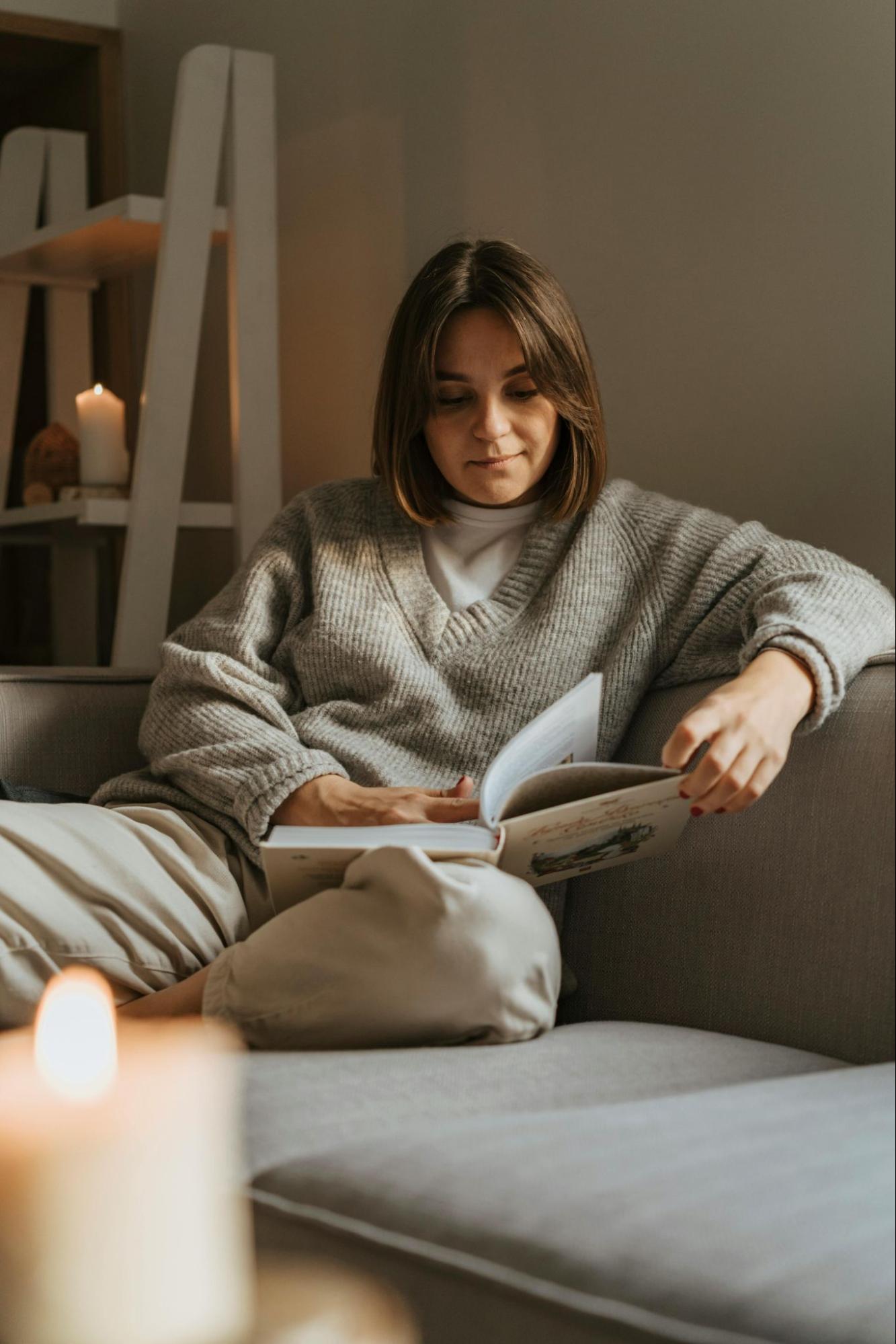 Woman relaxing the warmth of the living space