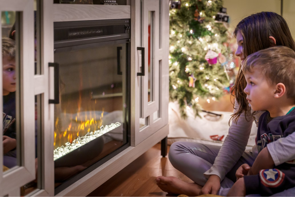 Kids enjoying warmth by the fireplace with a working thermostat.