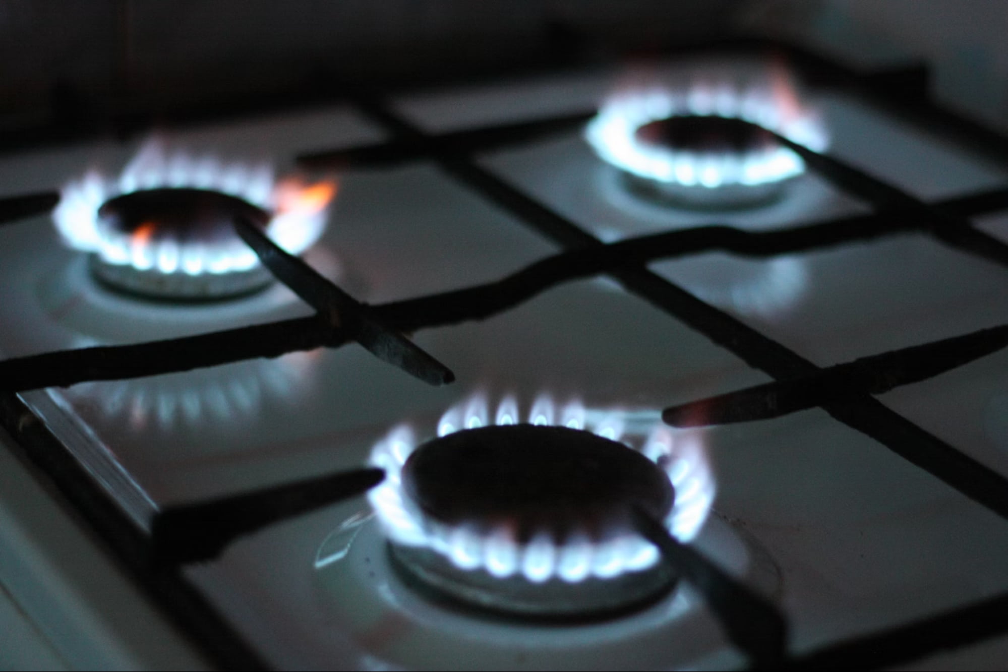 Stove with a burning flame, a potential source of Carbon Monoxide.
