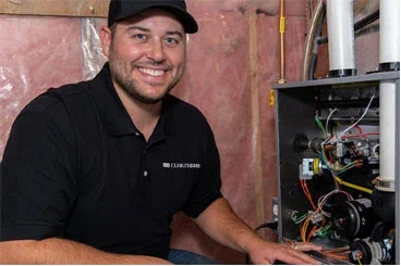 HVAC expert installing furnace
