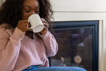 woman-drinking-in-a-cup